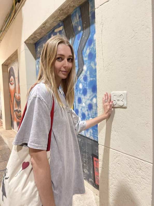 Placing a 5=3 plaque beside a doorway